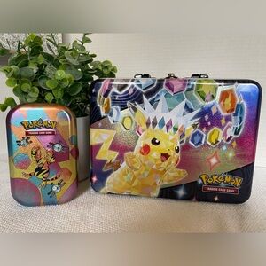 Pokemon Tins. ( 2 )Used, Has Some Dings And Scratches. Good Condition. No Cards.